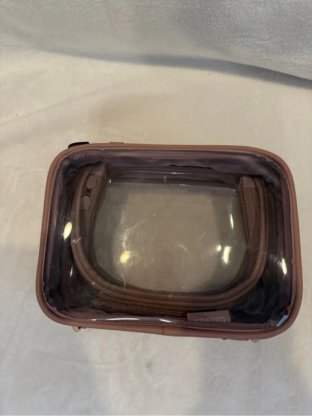 Calpak Small Clear Pink Travel Cosmetic Case in Mauve
